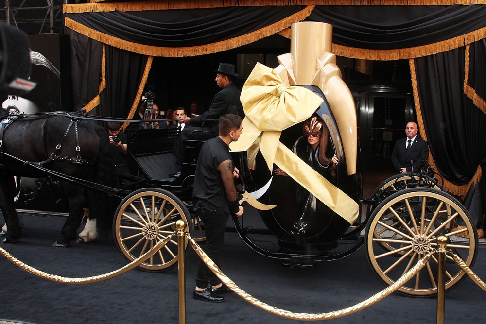 Lady GaGa;<br>Lady GaGa Arrives for Her Fame Fragrance Launch in A Horse-Drawn Carriage