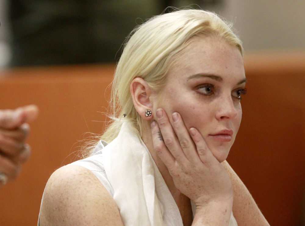 Lindsay Lohan;<br>Lindsay Lohan Before Being Escorted from The Courtroom in Handcuffs