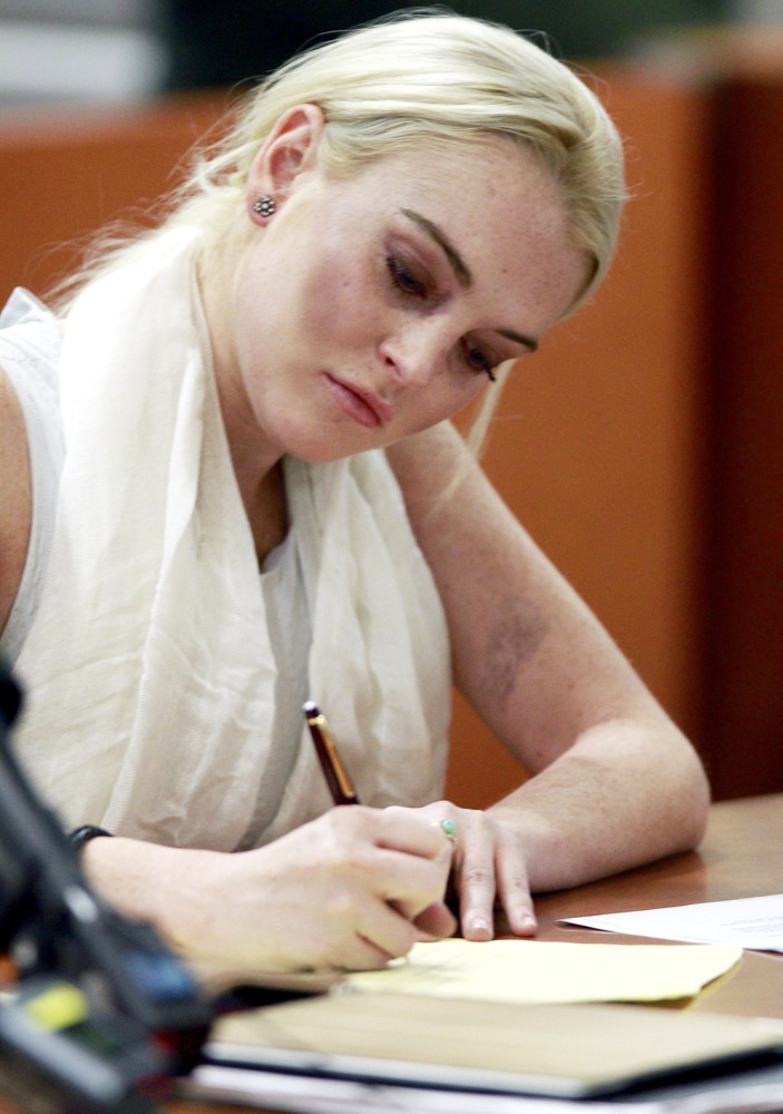 Lindsay Lohan;<br>Lindsay Lohan Before Being Escorted from The Courtroom in Handcuffs