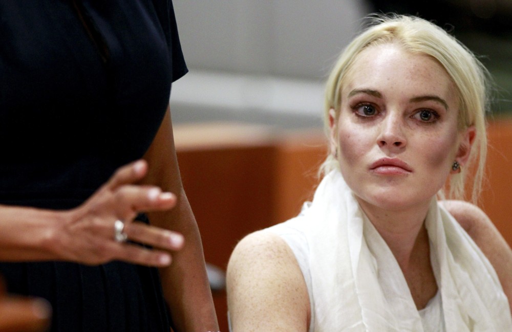 Lindsay Lohan;<br>Lindsay Lohan Before Being Escorted from The Courtroom in Handcuffs