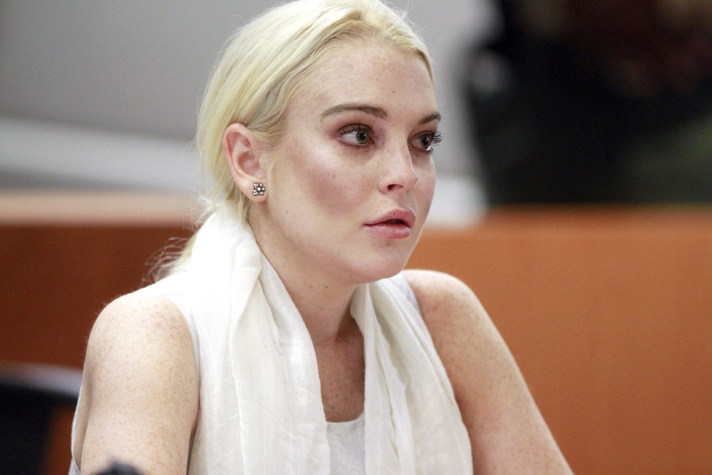 Lindsay Lohan;<br>Lindsay Lohan Before Being Escorted from The Courtroom in Handcuffs