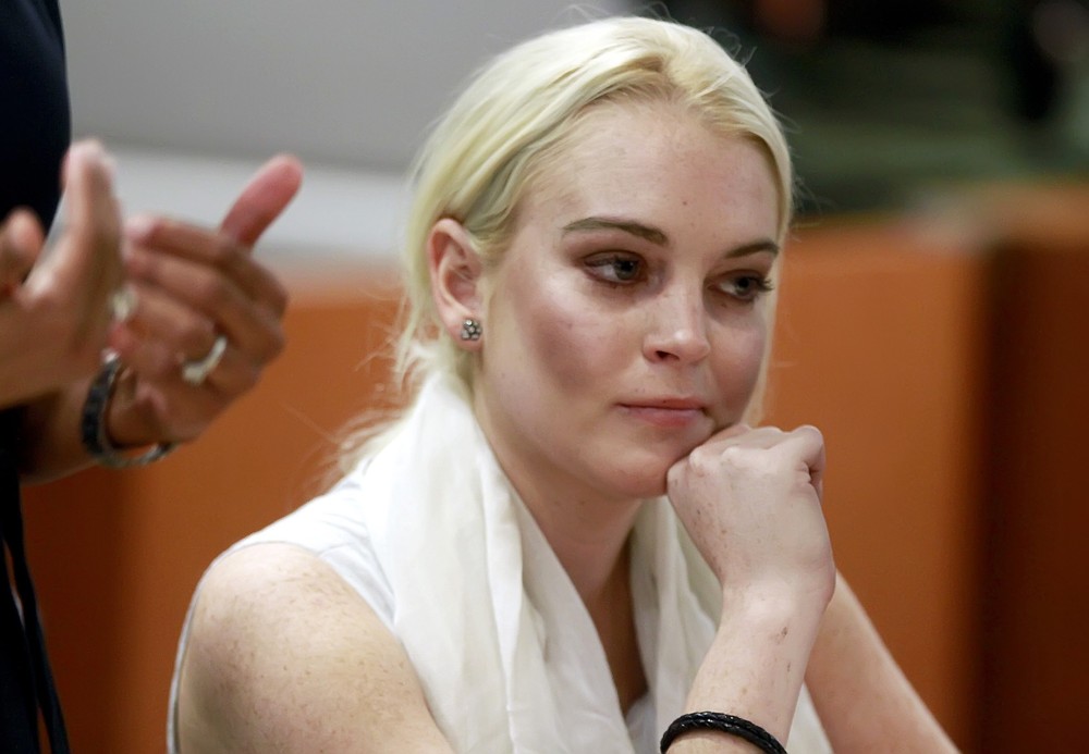 Lindsay Lohan;<br>Lindsay Lohan Before Being Escorted from The Courtroom in Handcuffs