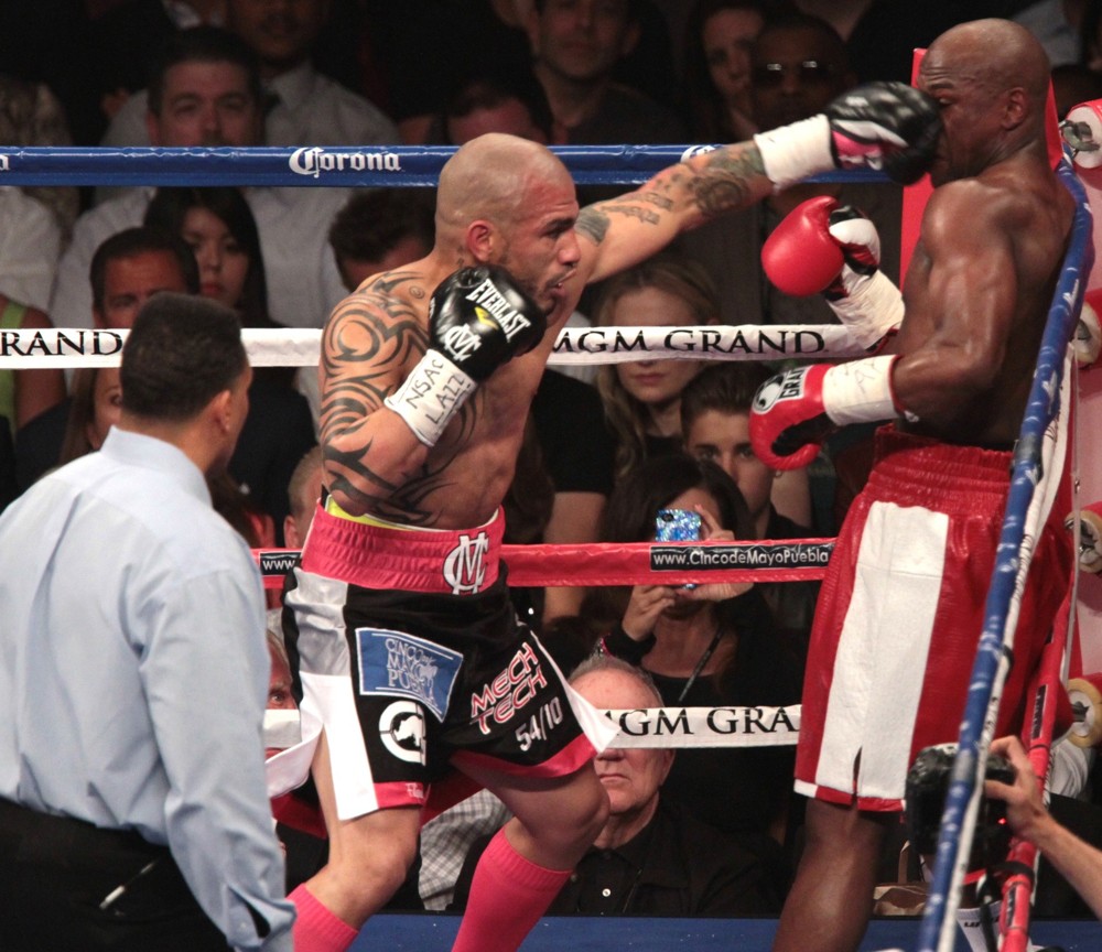 Miguel Cotto;Floyd Mayweather, Jr.;<br>The Fight Floyd Mayweather, Jr. Defeated Miguel Cotto by Way of A Twelve Round Unanimous Decision