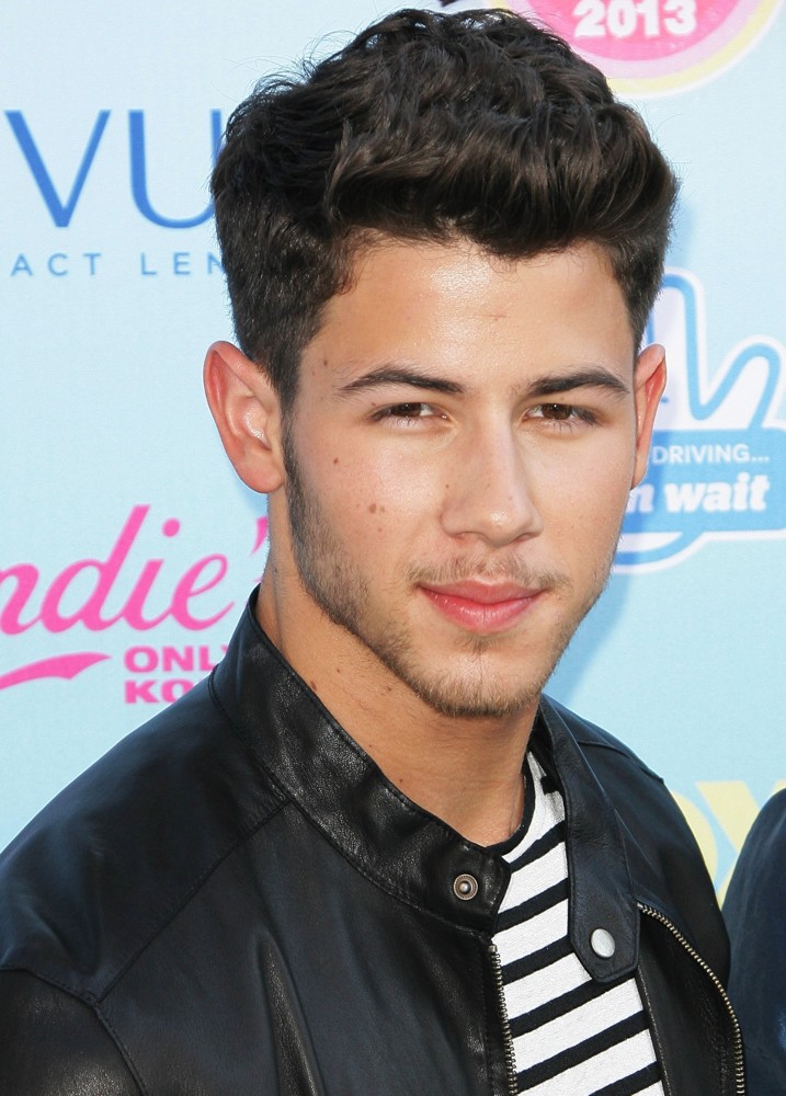 Nick Jonas, Jonas Brothers in 2013 Teen Choice Awards.