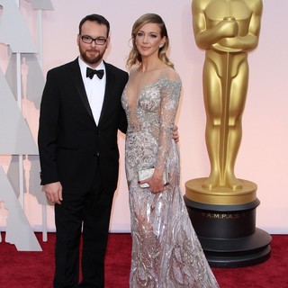 Dana Brunetti, Katie Cassidy in The 87th Annual Oscars - Red Carpet Arrivals