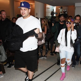 Rob Kardashian, Blac Chyna in Rob Kardashian and Blac Chyna Arrive at Los Angeles International Airport