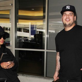 Blac Chyna, Rob Kardashian in Rob Kardashian and Blac Chyna Arrive at Los Angeles International Airport
