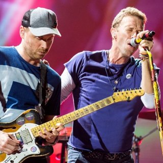 Jonny Buckland, Chris Martin, Coldplay in Coldplay Perform in Toronto