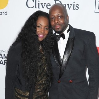 Claudinette Jean, Wyclef Jean in Clive Davis and Recording Academy Pre-GRAMMY Gala 2018 - Red Carpet Arrivals