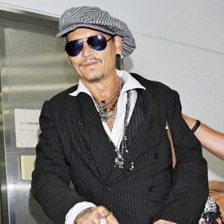 Johnny Depp in Johnny Depp at Narita International Airport in Tokyo