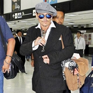 Johnny Depp in Johnny Depp at Narita International Airport in Tokyo