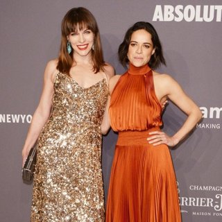 Milla Jovovich, Michelle Rodriguez in amfAR 2019 New York Gala - Red Carpet Arrivals