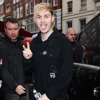 Five Seconds of Summer Seen Greeting Fans as They Leave Global Studios