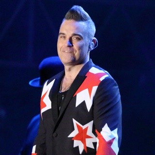 Robbie Williams in Robbie Williams Performing Live in Concert