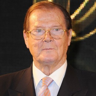 Roger Moore Signs Copies of His Book Bond on Bond