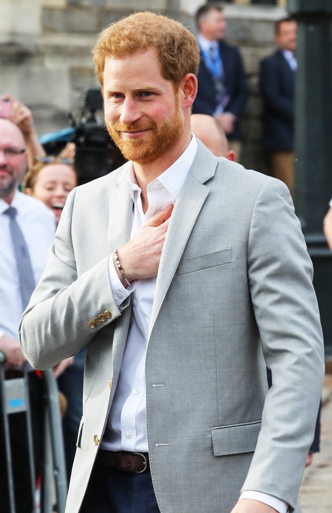 Prince Harry Greets The Crowds Outside Windsor Castle