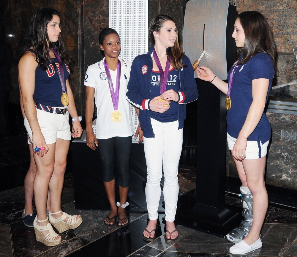 Aly Raisman;Gabrielle Douglas;McKayla Maroney;Jordyn Wieber;<br>US Women's Gymnastics Team Attending A Lighting Ceremony