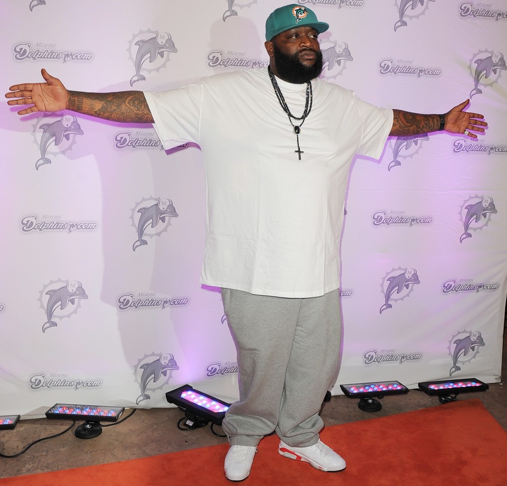 Rick Ross;<br>Rick Ross Arrives on The Orange Carpet Prior to The Miami Dolphins vs New England Patriots NFL Game
