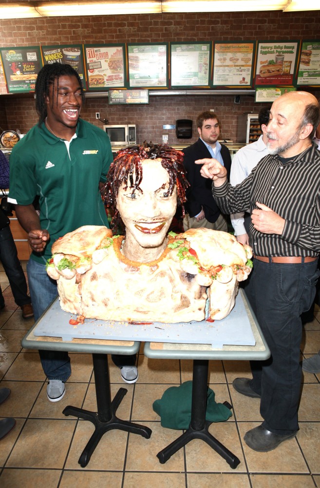 Robert Griffin III;<br>Unveils A New Lifesize Smokehouse BBQ Chicken