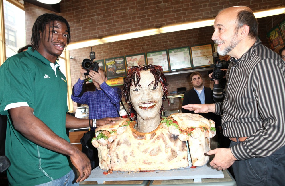 Robert Griffin III;<br>Unveils A New Lifesize Smokehouse BBQ Chicken