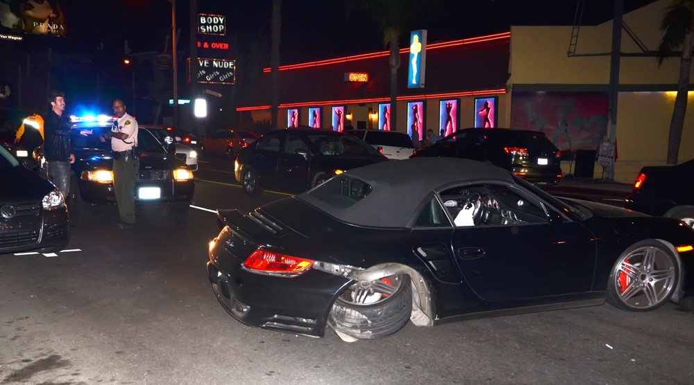 Robin Thicke;<br>Robin Thicke Gets A Ride from Cops After His Car Is Wrecked in A Shunt with Another Motorist