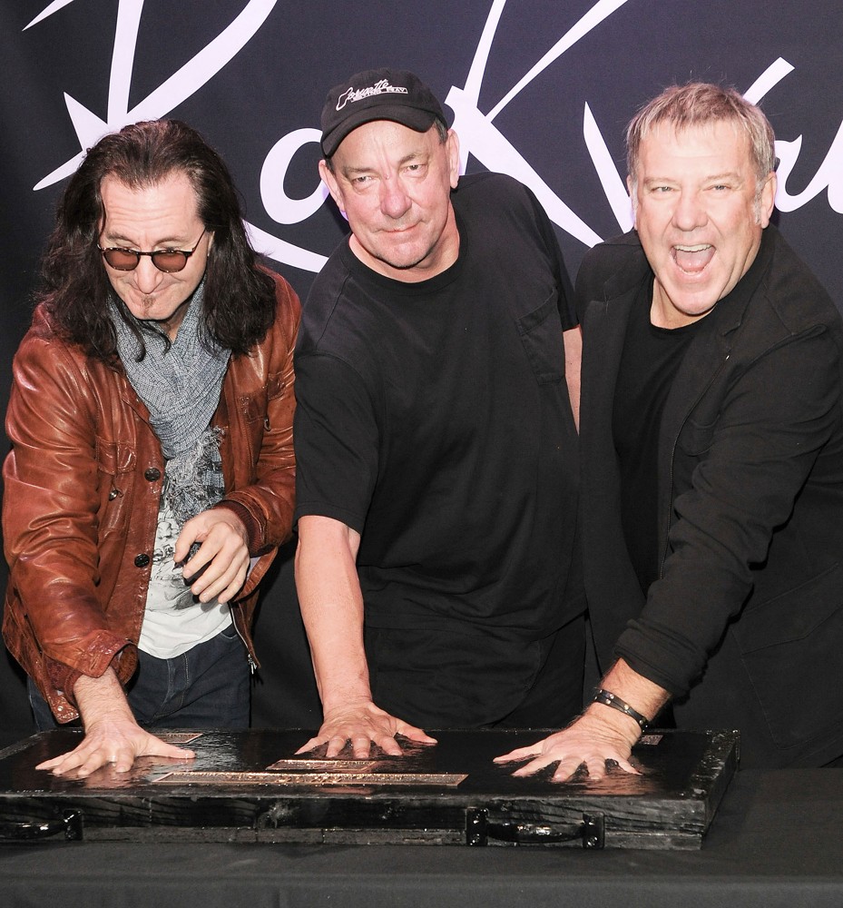 Rush;<br>Rush Honored on Guitar Center's RockWalk
