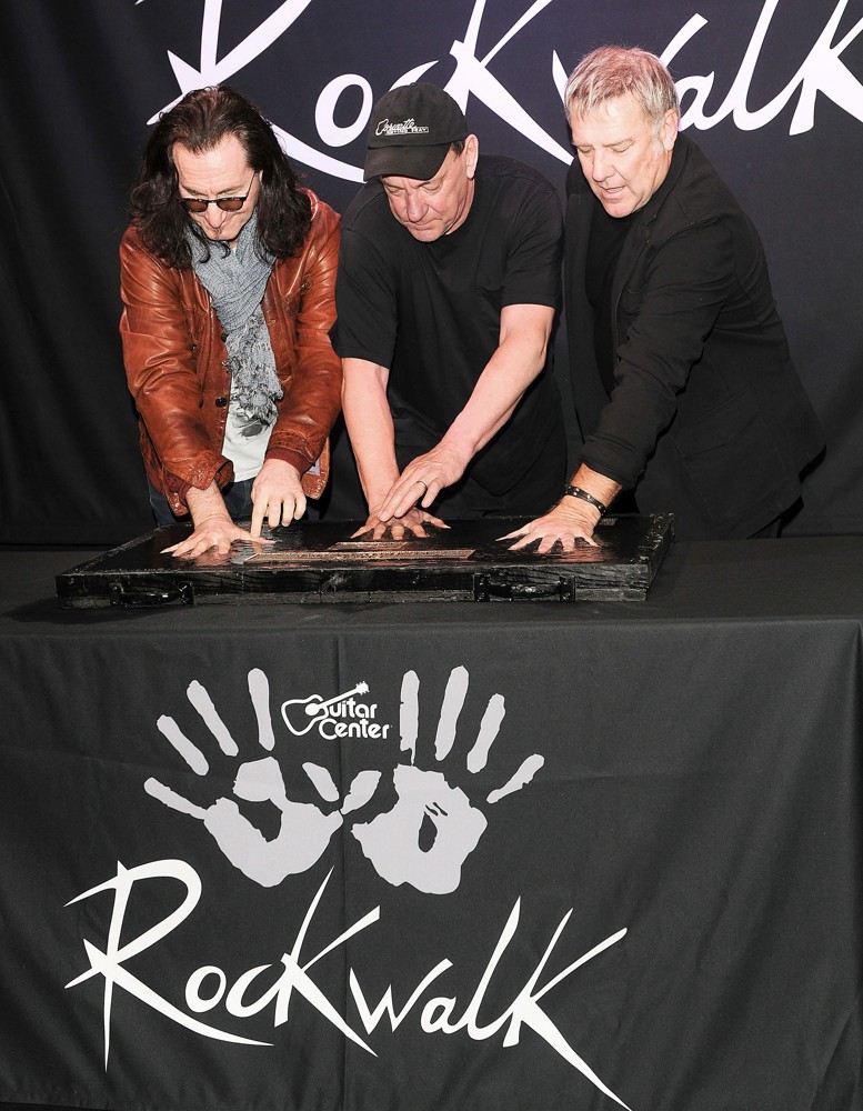 Rush;<br>Rush Honored on Guitar Center's RockWalk