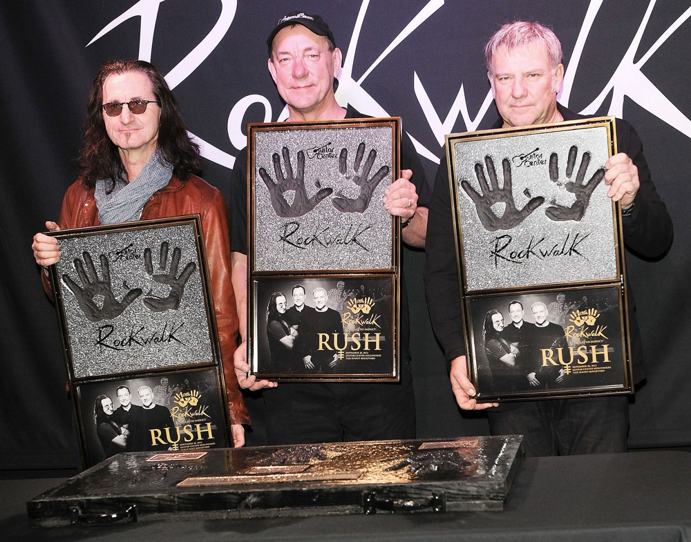 Rush;<br>Rush Honored on Guitar Center's RockWalk