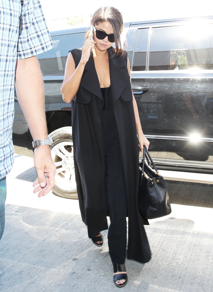 Selena Gomez;<br>Selena Gomez Reveals Cleavage at LAX