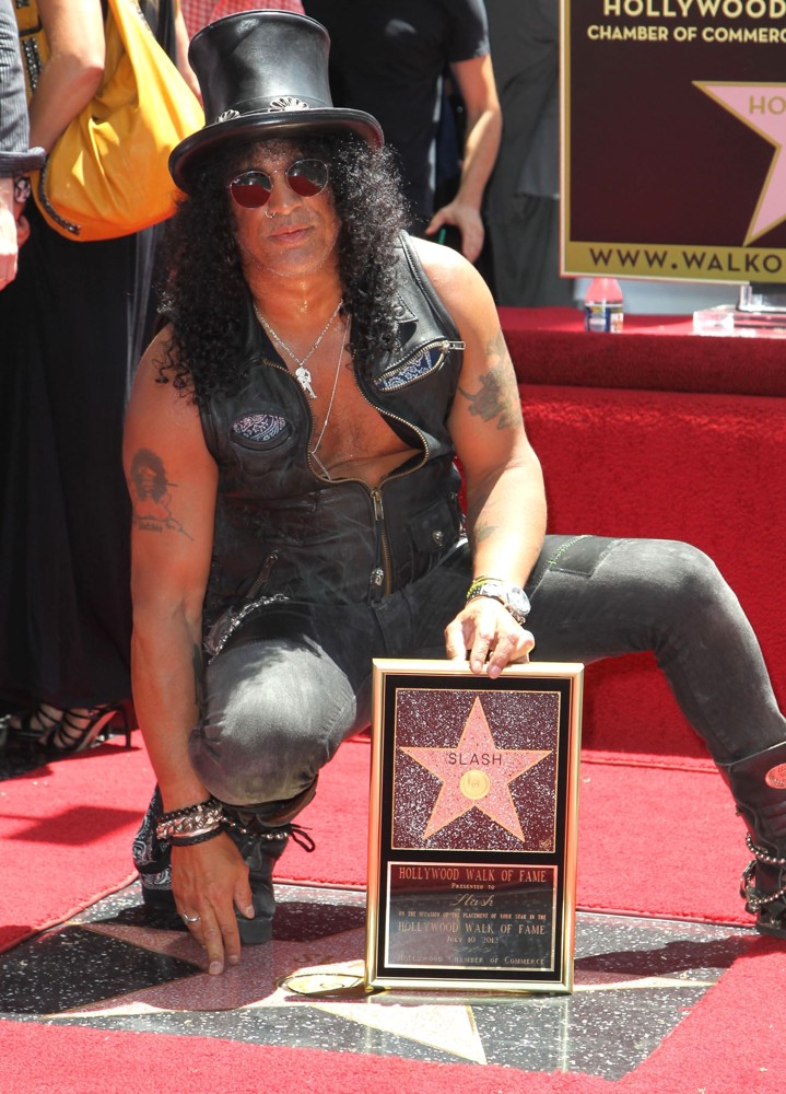 Slash;<br>Slash Honored with A Star on The Hollywood Walk of Fame
