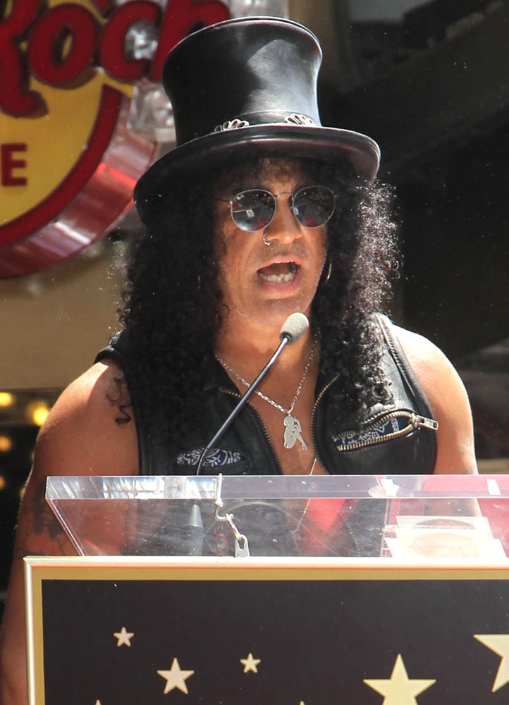 Slash;<br>Slash Honored with A Star on The Hollywood Walk of Fame