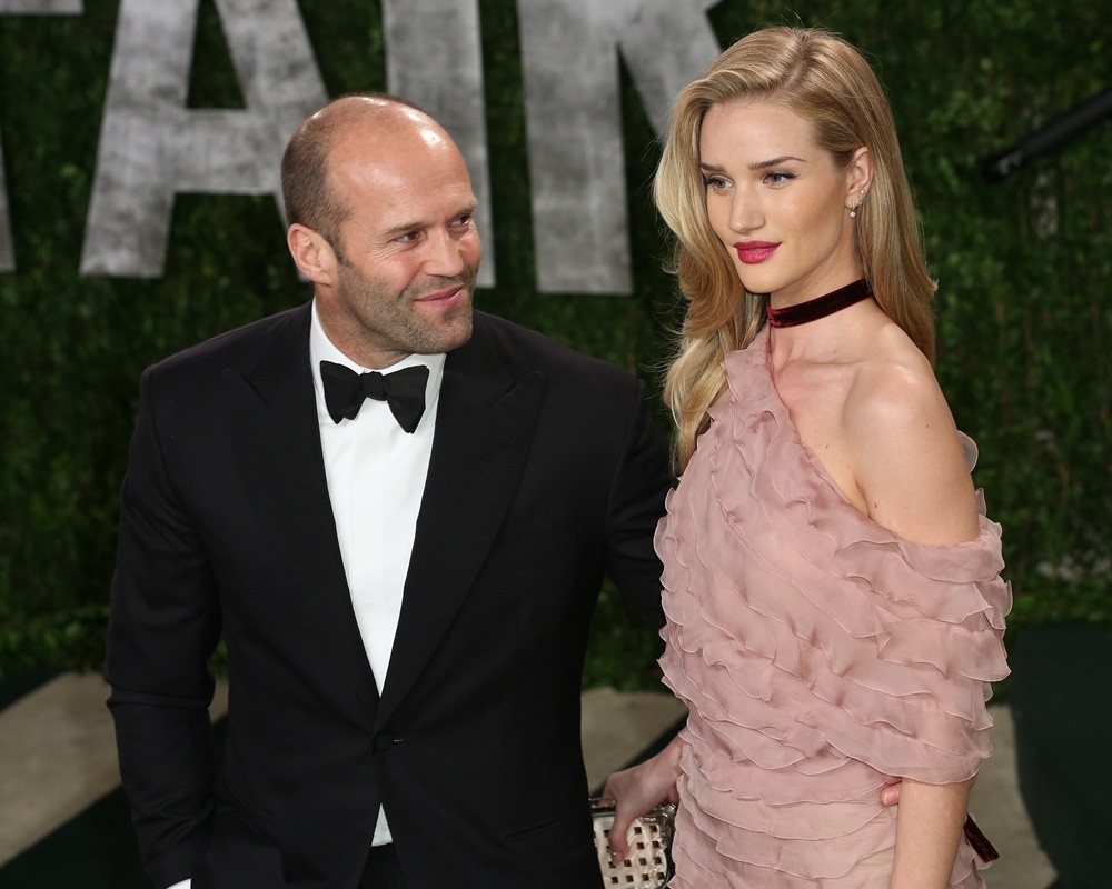 http://www.aceshowbiz.com/images/wennpic/statham-whiteley-2013-vanity-fair-oscar-party-01.jpg