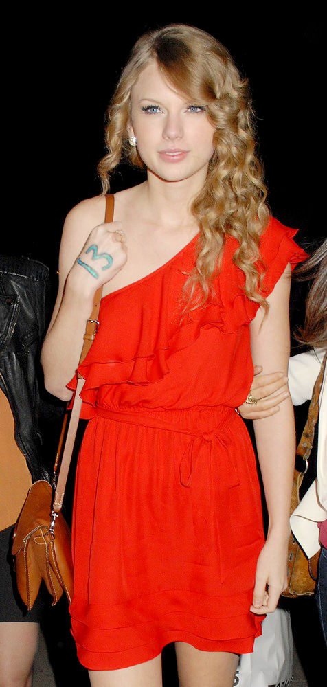 Taylor Swift;<br>Taylor Swift Arriving Back at Her Hotel with A Female Companion