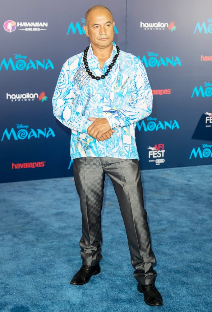 Temuera Morrison wearing blue and grey at the Moana premiere