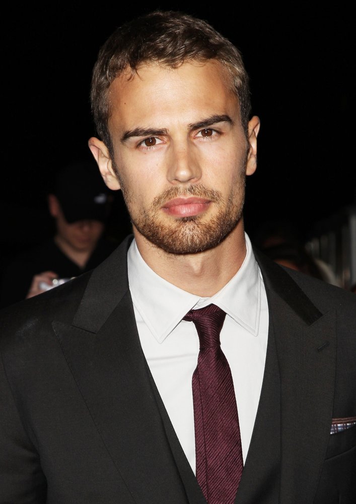 Theo James in Premiere of Summit Entertainment's Divergent - Red Carpe...