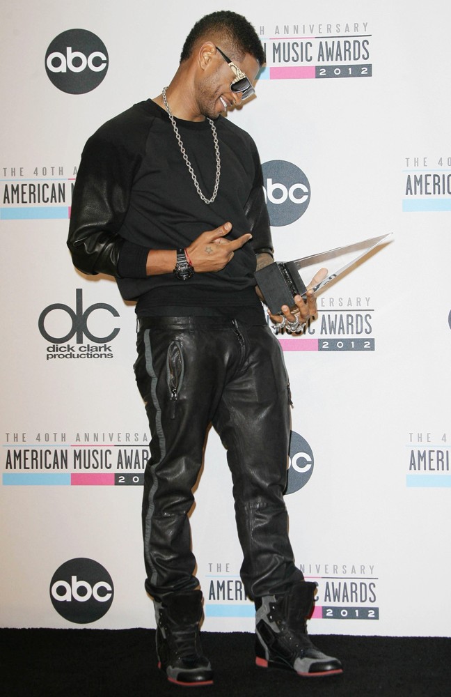 Usher;<br>The 40th Anniversary American Music Awards - Press Room