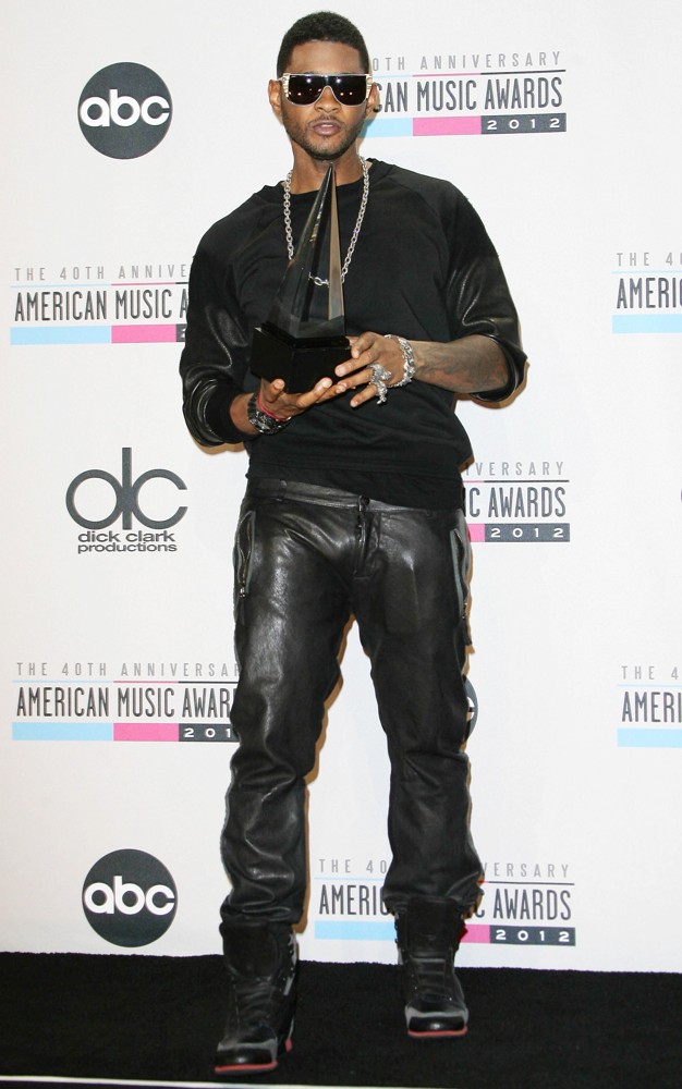 Usher;<br>The 40th Anniversary American Music Awards - Press Room