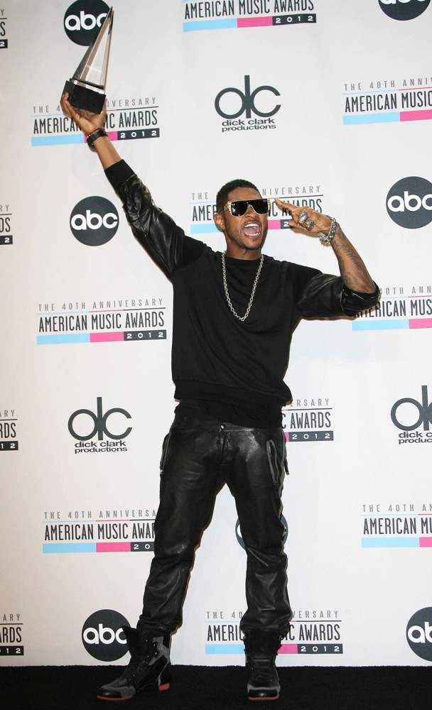 Usher;<br>The 40th Anniversary American Music Awards - Press Room