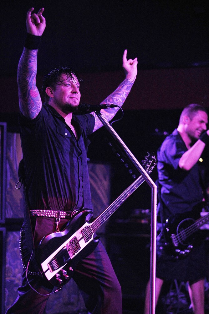 Michael Poulsen;Anders Kjolholm;Volbeat;<br>Volbeat Perform
