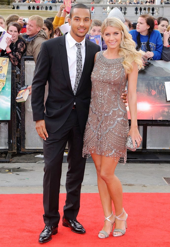 Theo Walcott;Melanie Slade;<br>Harry Potter and the Deathly Hallows Part II World Film Premiere - Arrivals