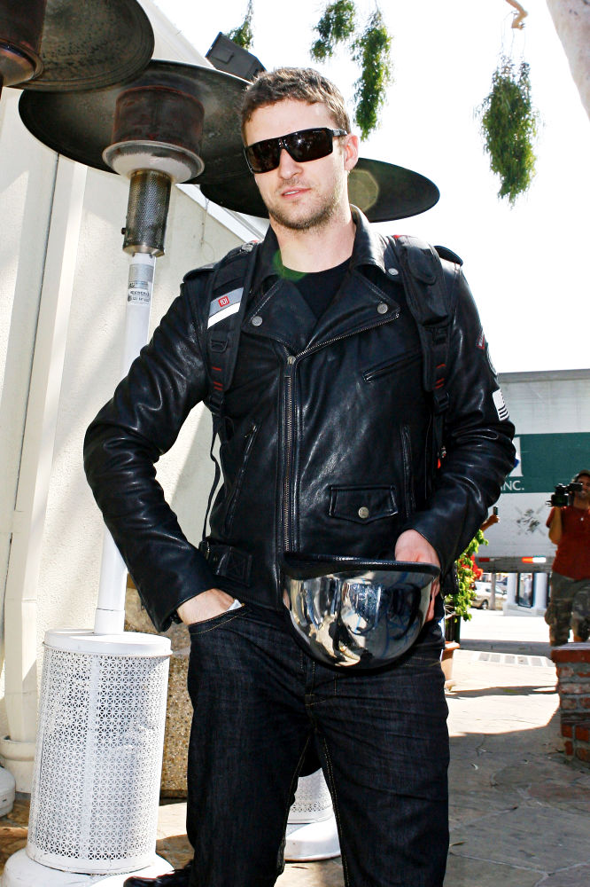 Justin Timberlake;<br>Justin Timberlake is surrounded by photographers as he leaves Cafe Med on his custom Harley-Davidson