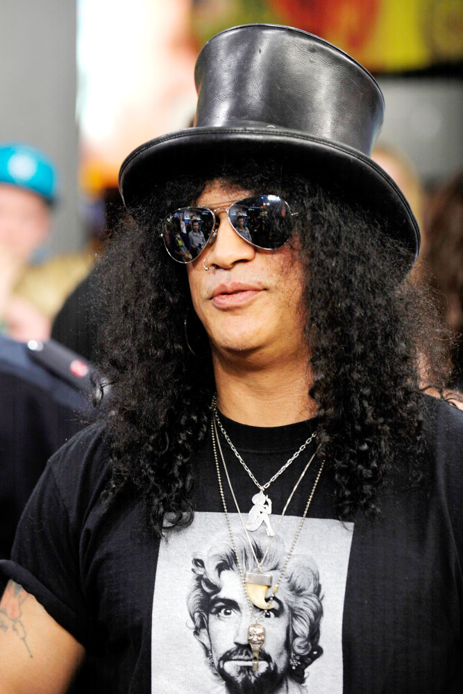 Slash;<br>Slash appears on MuchMusic's 'Much On Demand' to promote his upcoming album