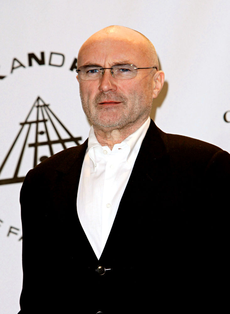 Phil Collins Had to Tape Drumsticks Post Neck Surgery