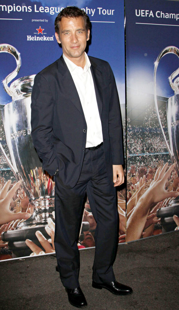 Clive Owen;<br>Heineken is Introducing The UEFA Champions League Soccer Trophy to The USA