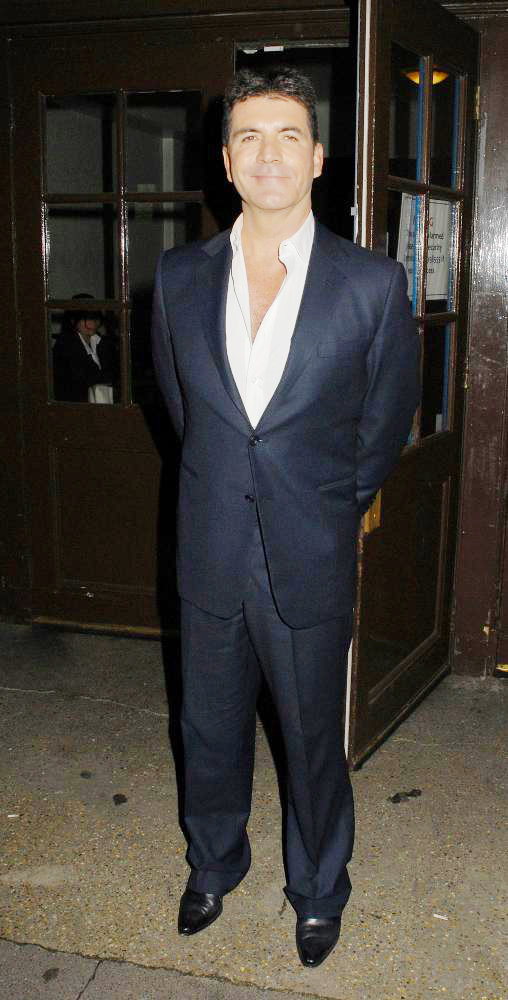 Simon Cowell;<br>News of The World, Childrens Champions Awards - Departures