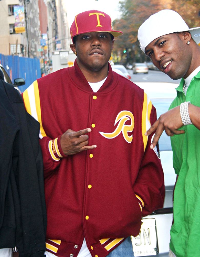 Ma$e;<br>Mase Wearing A Burgundy Jjacket and Cap Leaving His NYC Hotel with His Crew