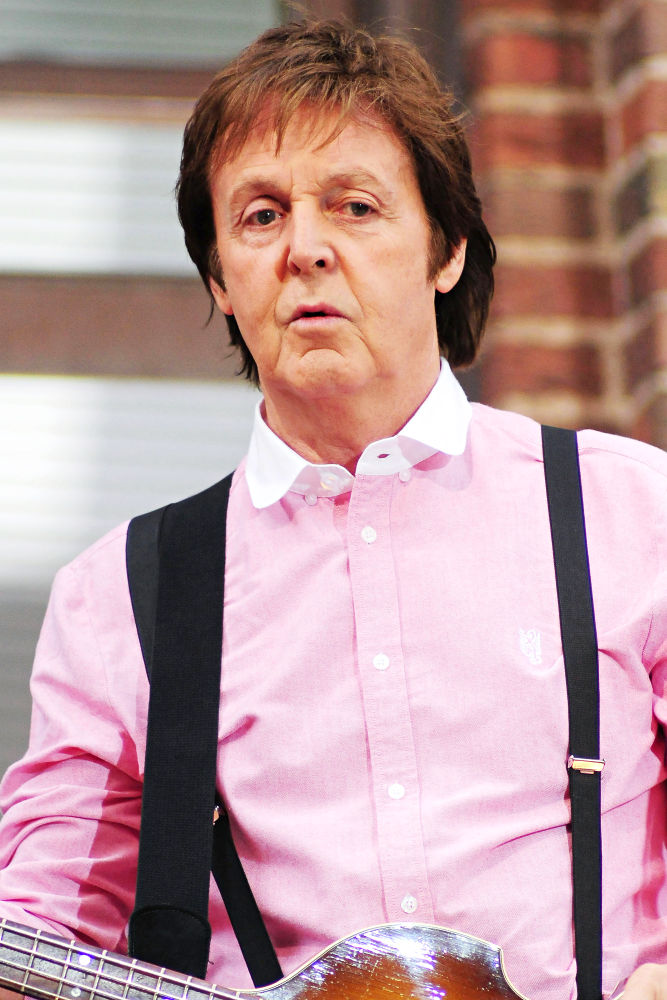 Paul McCartney;<br>Paul McCartney performing live on the marquee of the Ed Sullivan Theater