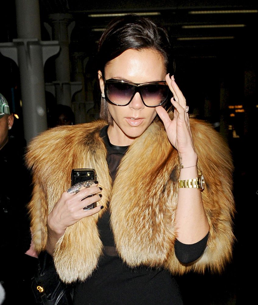 Victoria Adams;<br>Victoria Beckham arriving in London while wearing a see-through black top