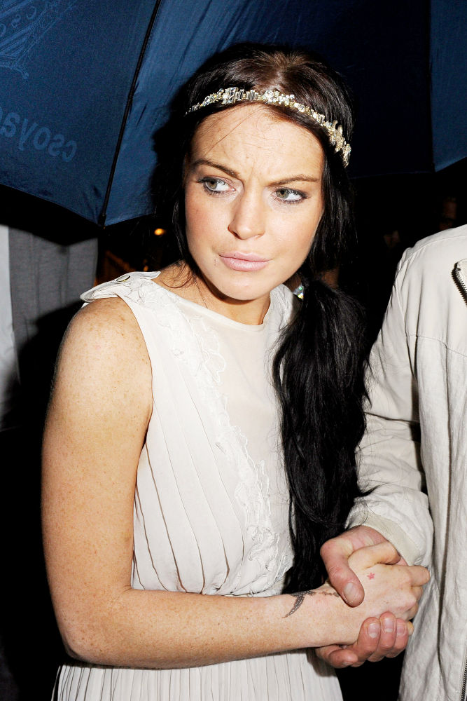Lindsay Lohan's Father Denies Stealing Her Passport