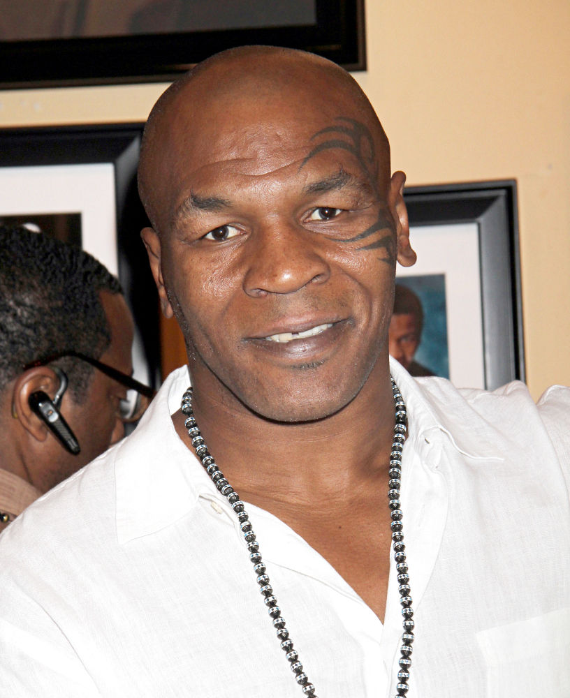 Mike Tyson;<br>Mike Tyson Signs Autograph